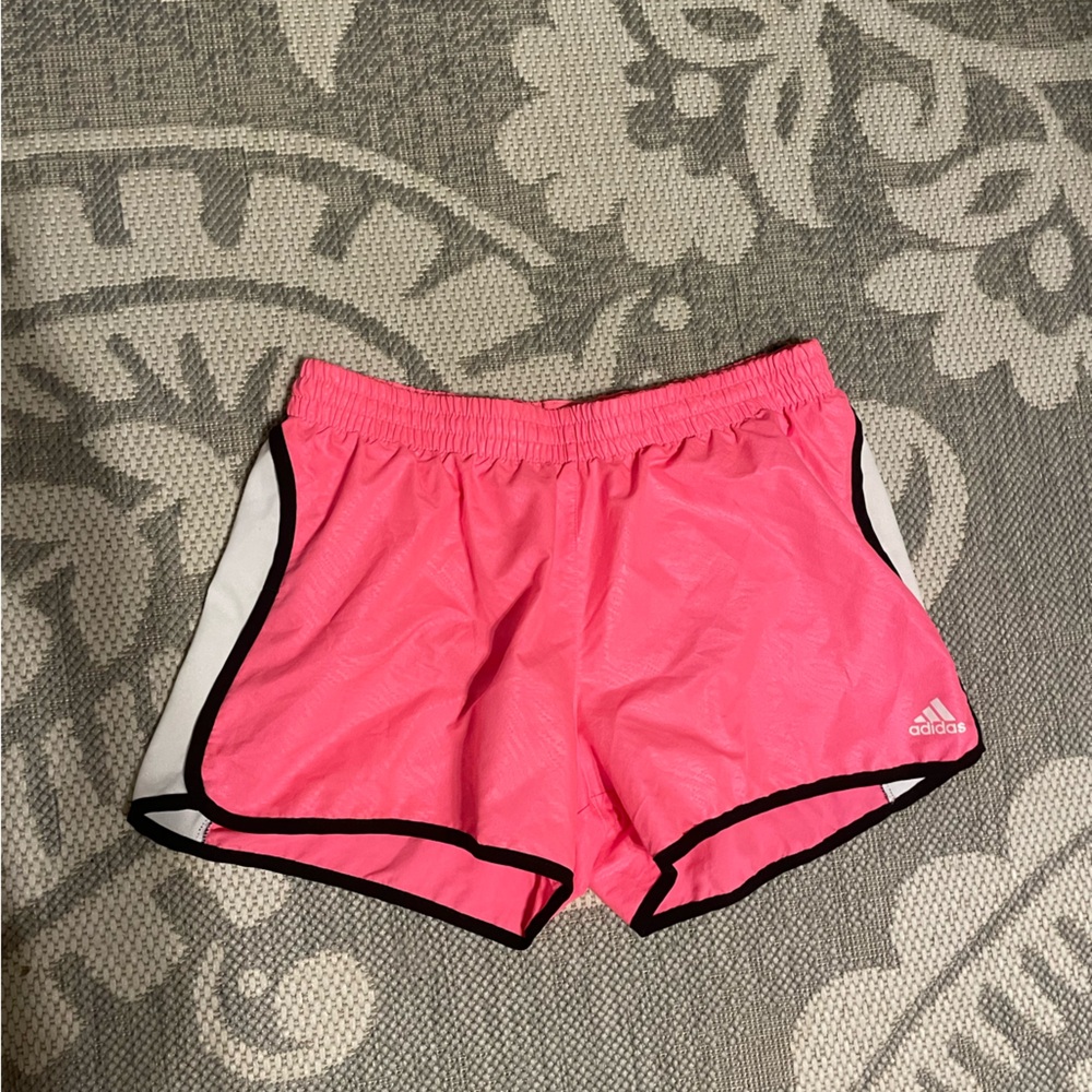 Adidas women’s XS pink, white, and black running shorts